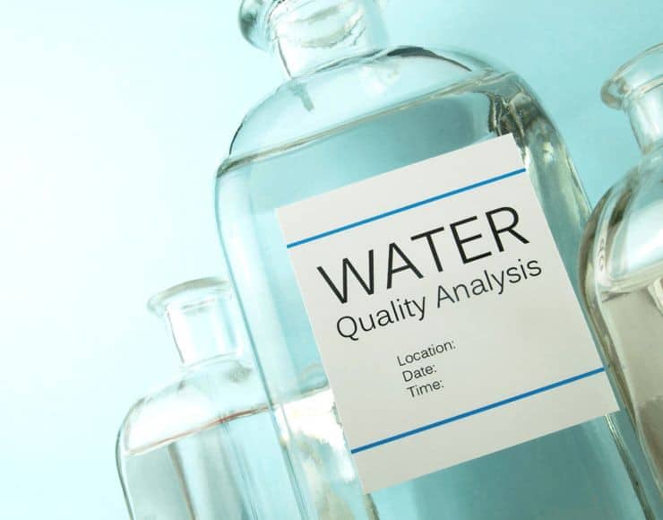 Water quality analysis testing bottles.
